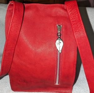 Neta Sade red leather crossbody bag.